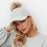 Model wearing light grey Impressive Women Pom-Pom Cap