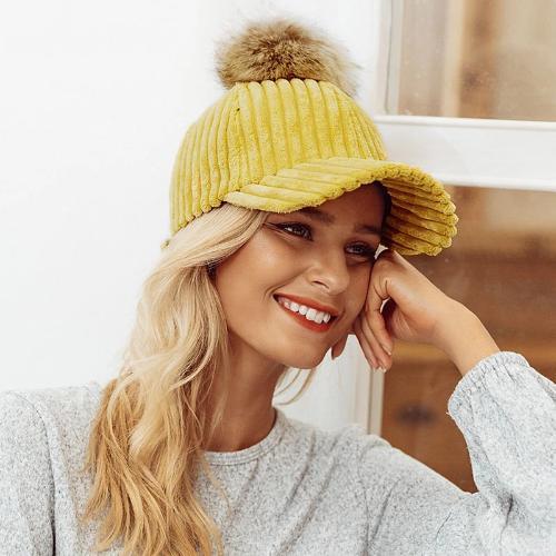 Model wearing ginger Impressive Women Pom-Pom Cap