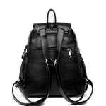 Backpack with rear zipper pocket