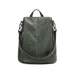 green leather backpack purse