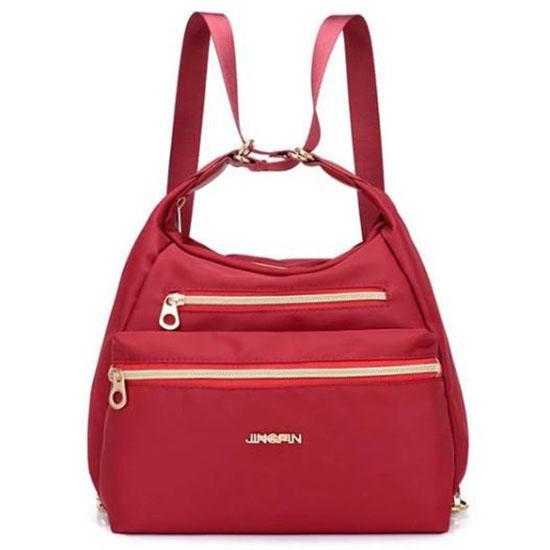 Red nylon crossbody convertible bag