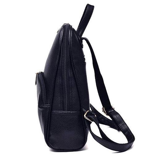 small leather backpak with wide opening