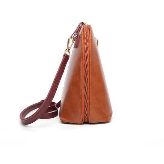 Wide opening leather handbag