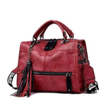 Red Crossbody leather bag with tassels