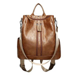 Brown vintage leather backpack with shoulder strap