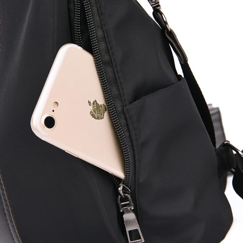 Backpack purse with side zipper pocket