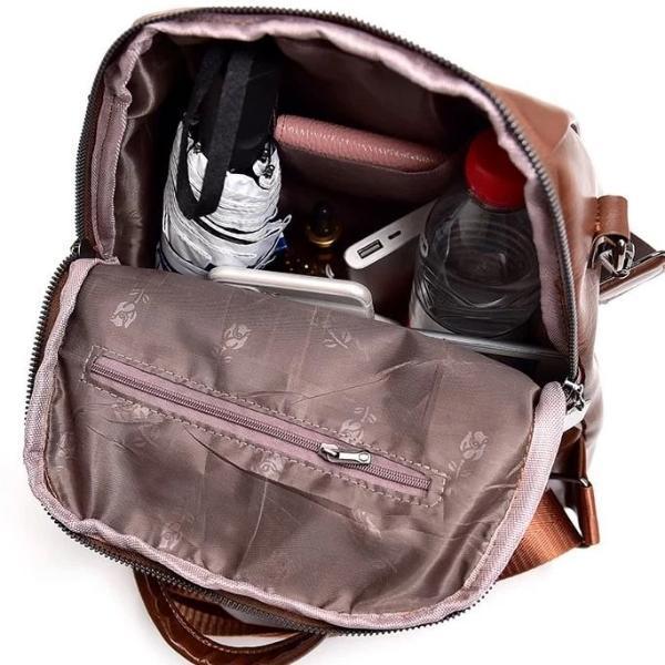 Small vegan leather backpack can hold water bottle