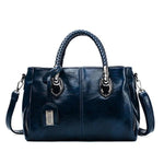 Blue leather handbag with triple compartment
