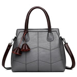 Gray leather cross body handbags with top handles