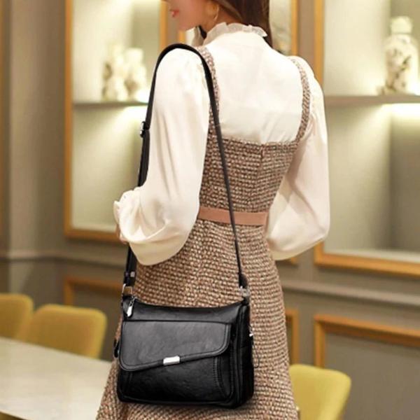 Black leather bag with large front pocket