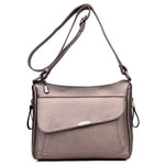 Bronze leather crossbody bag with large front pocket