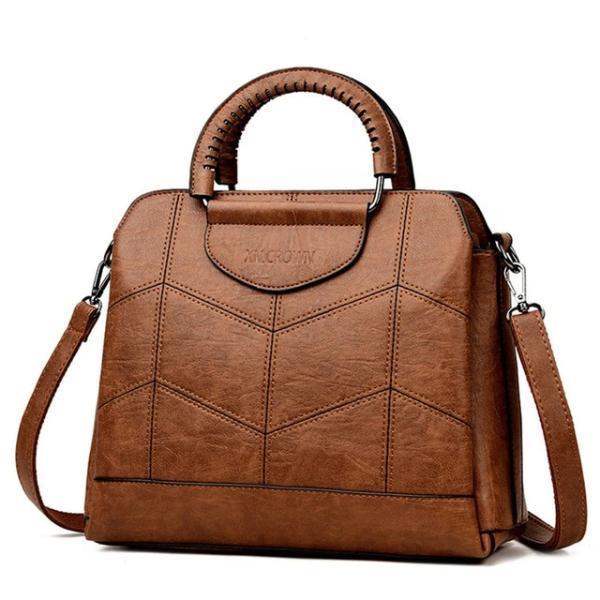 Brown leather crossbody purse with lots of compartments