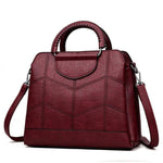 Red wine leather crossbody purse with lots of compartments