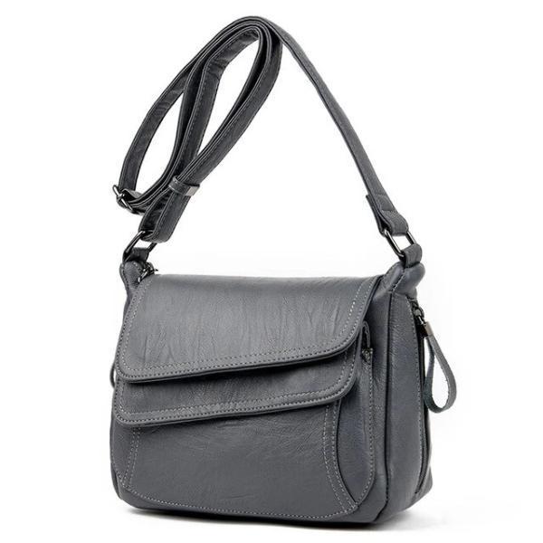 Gray leather crossbody bag with lots of pockets