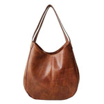 Brown triple compartment leather shoulder bag