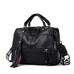 Black Crossbody leather bag with tassels