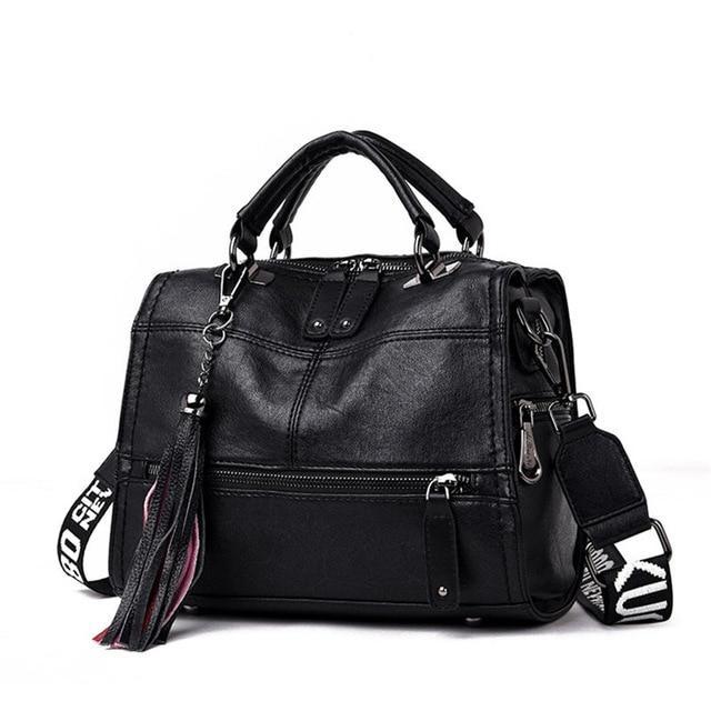 Black Crossbody leather bag with tassels