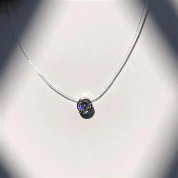 Diamond pendant with transparent necklace