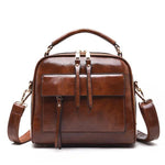 Brown leather crossbody bags with multiple compartments