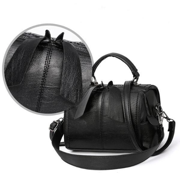 Black leather barrel bag