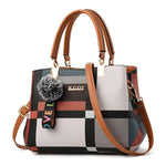 Plaid crossbody bag with brown handles