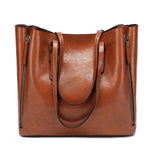 Brown leather tote bags with zipper closure