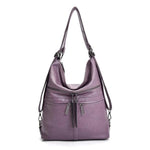 Purple leather crossbody backpack bag