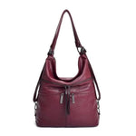 Red leather crossbody backpack bag