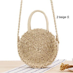 Light beige straw bag with handle and strap