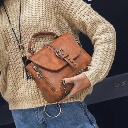Brown leather with spikes and studd