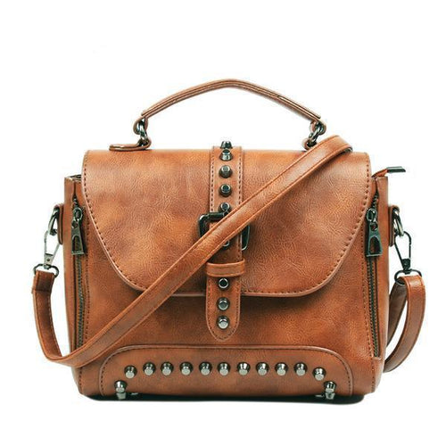 Brown Vintage handbag with rivets and spikes