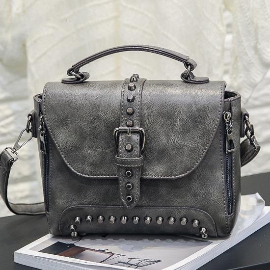 Gray Vintage handbag with rivets and spikes