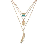 Gold Feather necklace pendant
