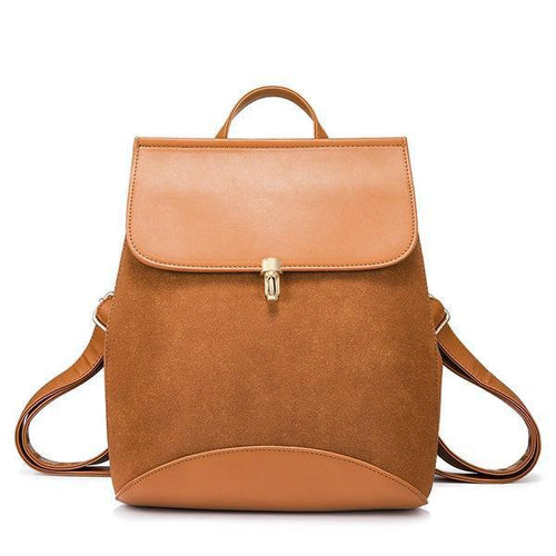 Brown leather backpack with convertible shoulder strap