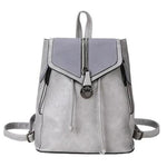 Gray leather convertible backpack purse with crossbody strap