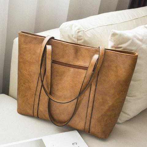 Brown leather tote with back zipper
