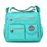 emerald crossbody travel bag water bottle holder