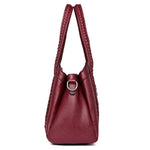 lateral red leather handbag
