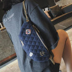 blue fanny pack with gold chain strap