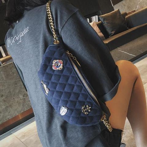 blue fanny pack with gold chain strap