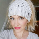 Model wearing beige Montana, Beautiful Ponytail Beanie for Women