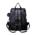 Black anti theft backpack with back opening compartment