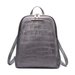 Silver alligator leather backpack with convertible strap