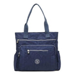 Blue waterproof tote bag with zipper