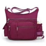 Purple Crossbody bag with water bottle holder