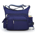 Blue crossbody bag with water bottle holder