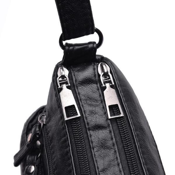Black vegan leather bag with 2 zippered pocket