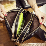 Black bag with triple zipper compartmet